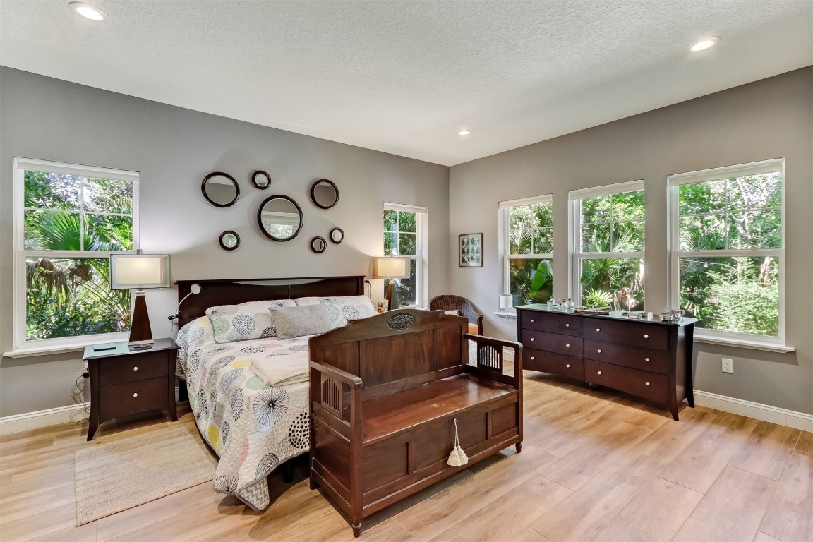 2629 Racheal Avenue Fernandina Beach, FL 32034 - Photo 15 of 53 a bed room with a bed and a large window