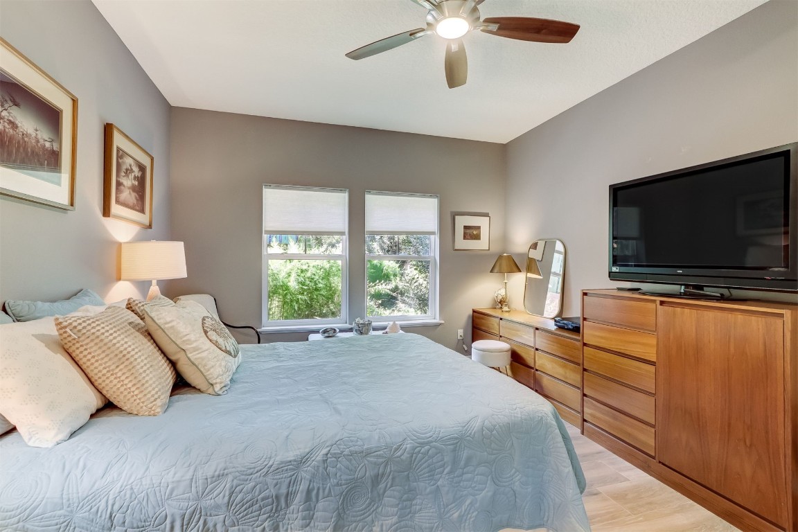 2629 Racheal Avenue Fernandina Beach, FL 32034 - Photo 19 of 53 a bedroom with a bed and a flat screen tv