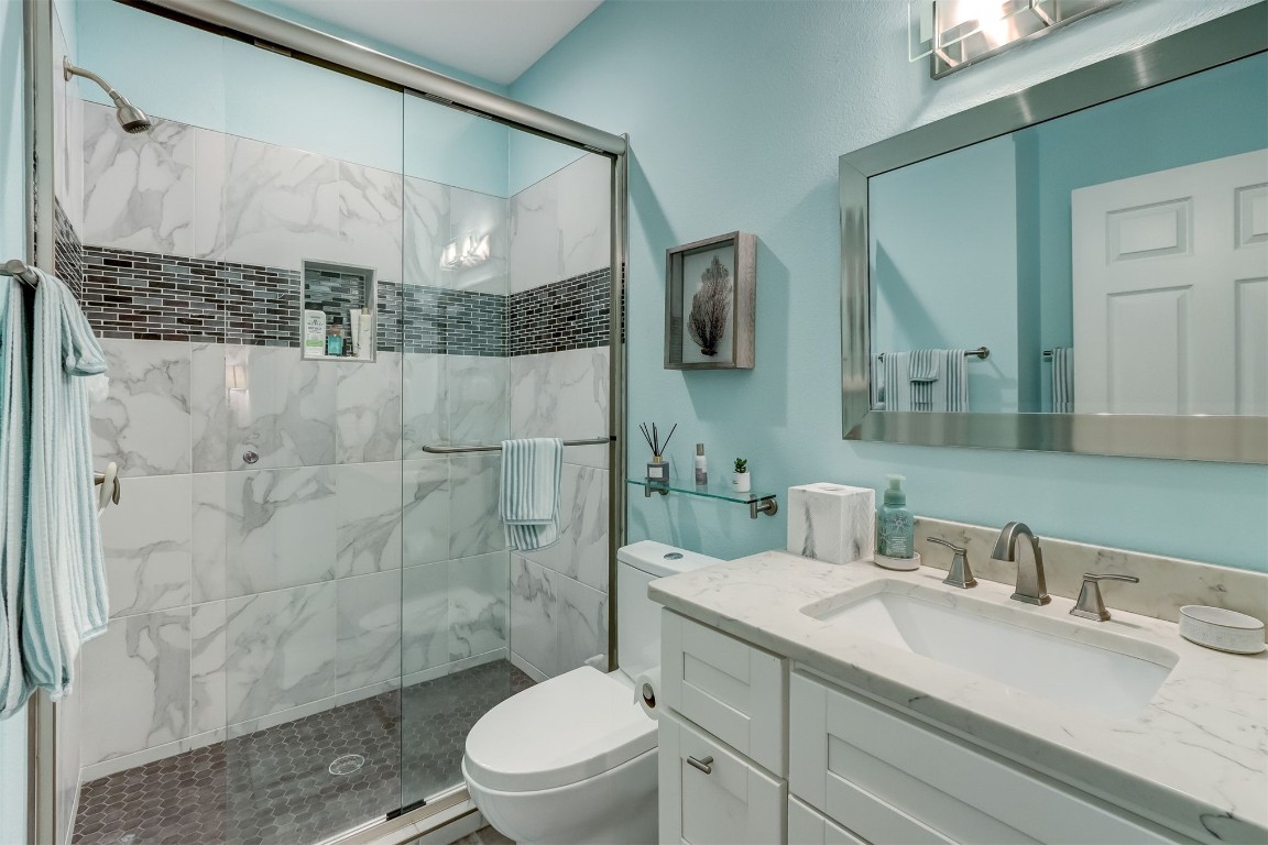 2629 Racheal Avenue Fernandina Beach, FL 32034 - Photo 20 of 53 a bathroom with a sink a toilet and shower