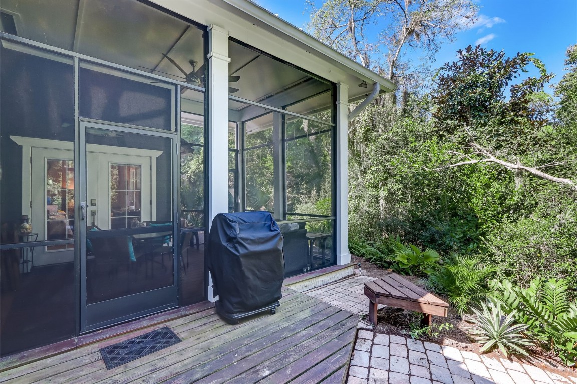 2629 Racheal Avenue Fernandina Beach, FL 32034 - Photo 29 of 53 a view of balcony with chairs and wooden fence