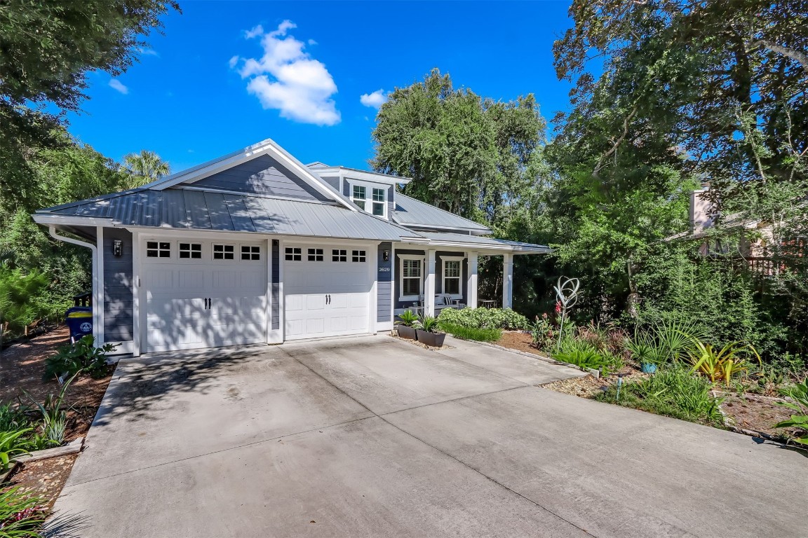 2629 Racheal Avenue Fernandina Beach, FL 32034 - Photo 37 of 53 a front view of a house with a garden
