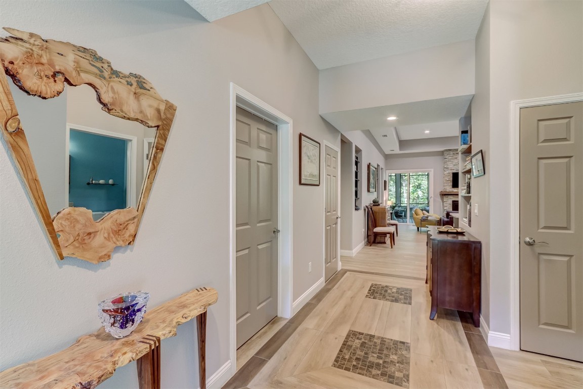2629 Racheal Avenue Fernandina Beach, FL 32034 - Photo 4 of 53 a view of a hallway to a livingroom and a dining room with furniture