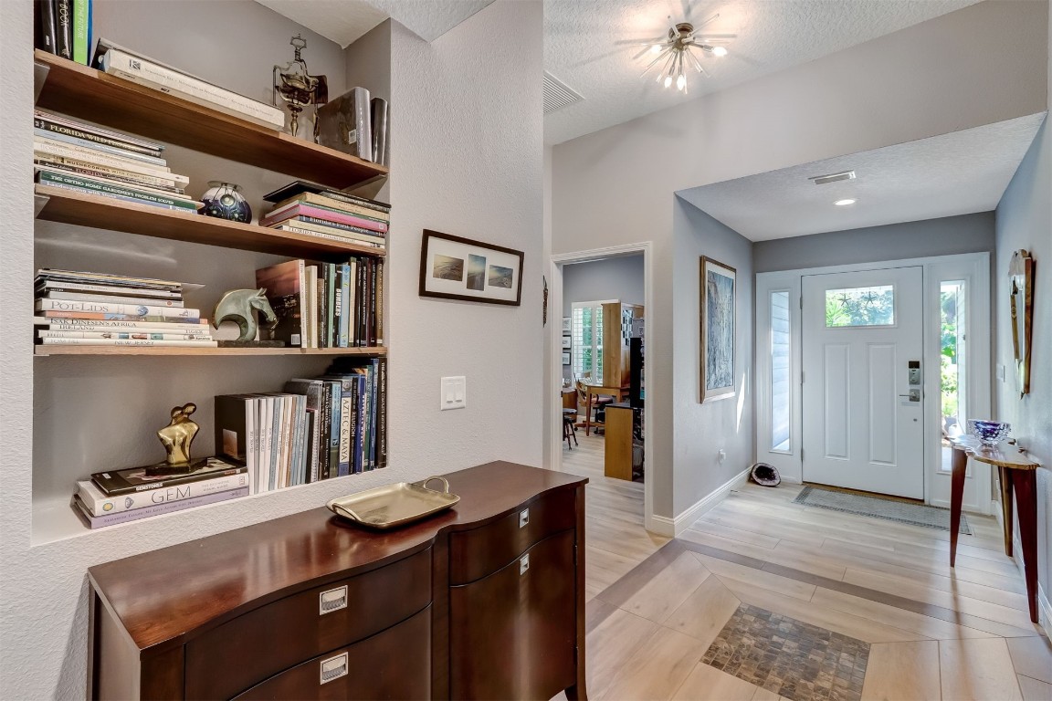 2629 Racheal Avenue Fernandina Beach, FL 32034 - Photo 5 of 53 a hallway with cabinets