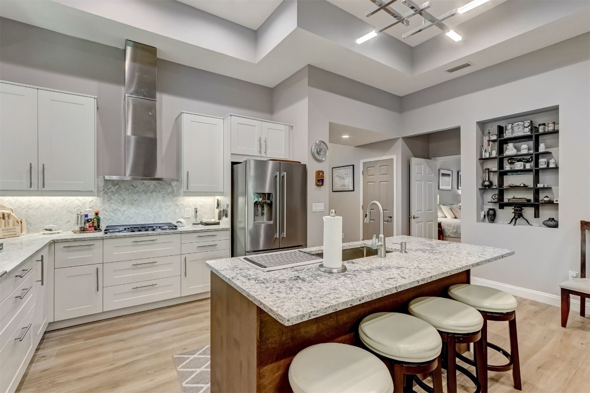 2629 Racheal Avenue Fernandina Beach, FL 32034 - Photo 8 of 53 a kitchen with granite countertop stainless steel appliances a sink stove and refrigerator