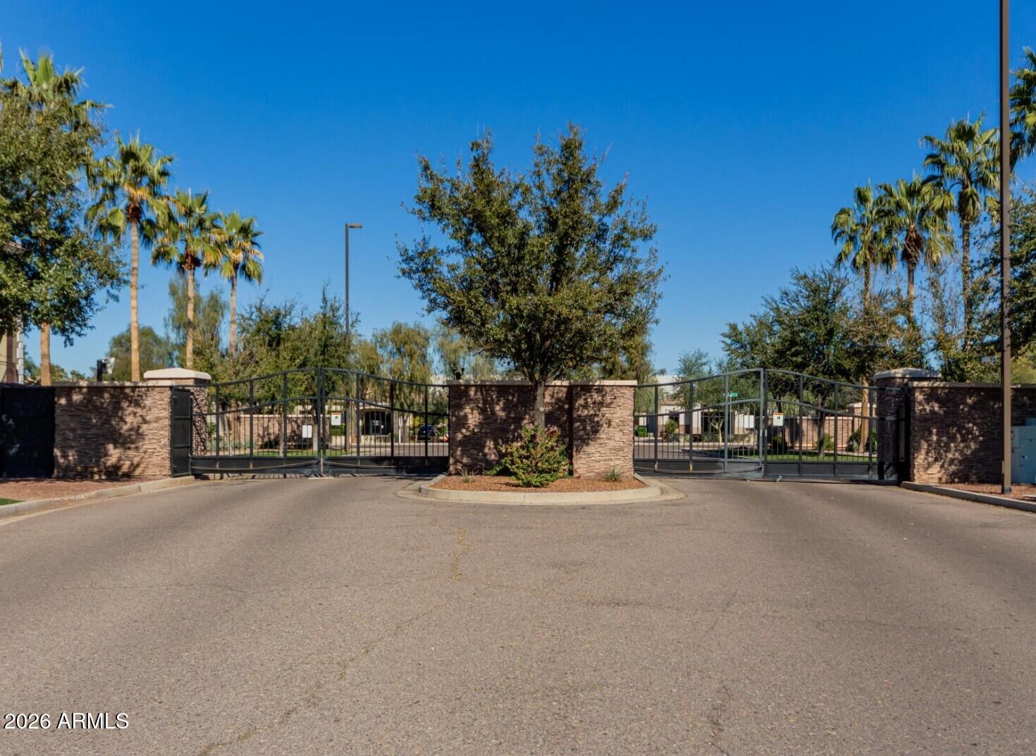 1821 East Bernie Lane, Unit 103 Gilbert, AZ 85295 - Photo 24 of 57 Annecy gated entrance