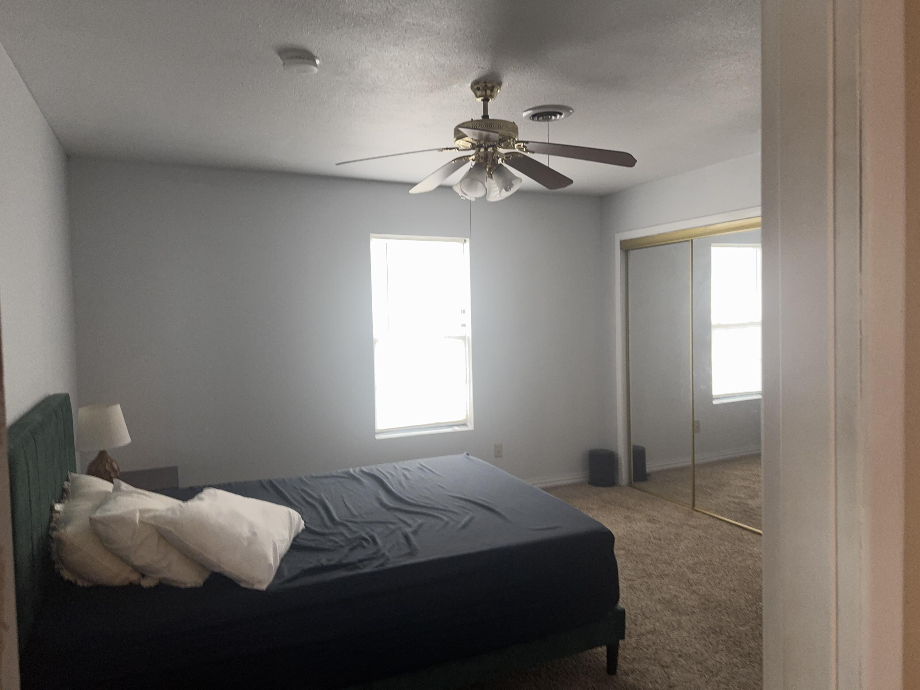 1306 Southeast 11th Avenue Amarillo, TX 79102 - Photo 5 of 6 a bedroom with a bed and a window