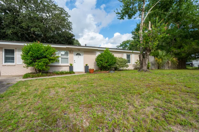 front view of house with a yard