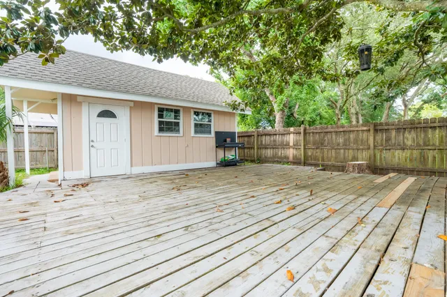 a view of a backyard of the house