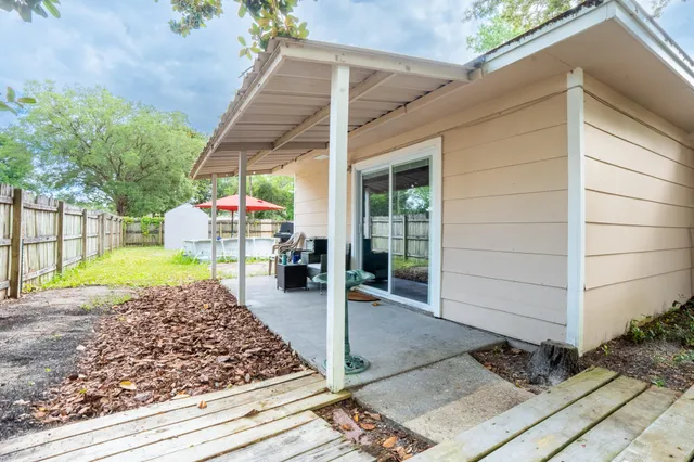 a view of a backyard house and a garden