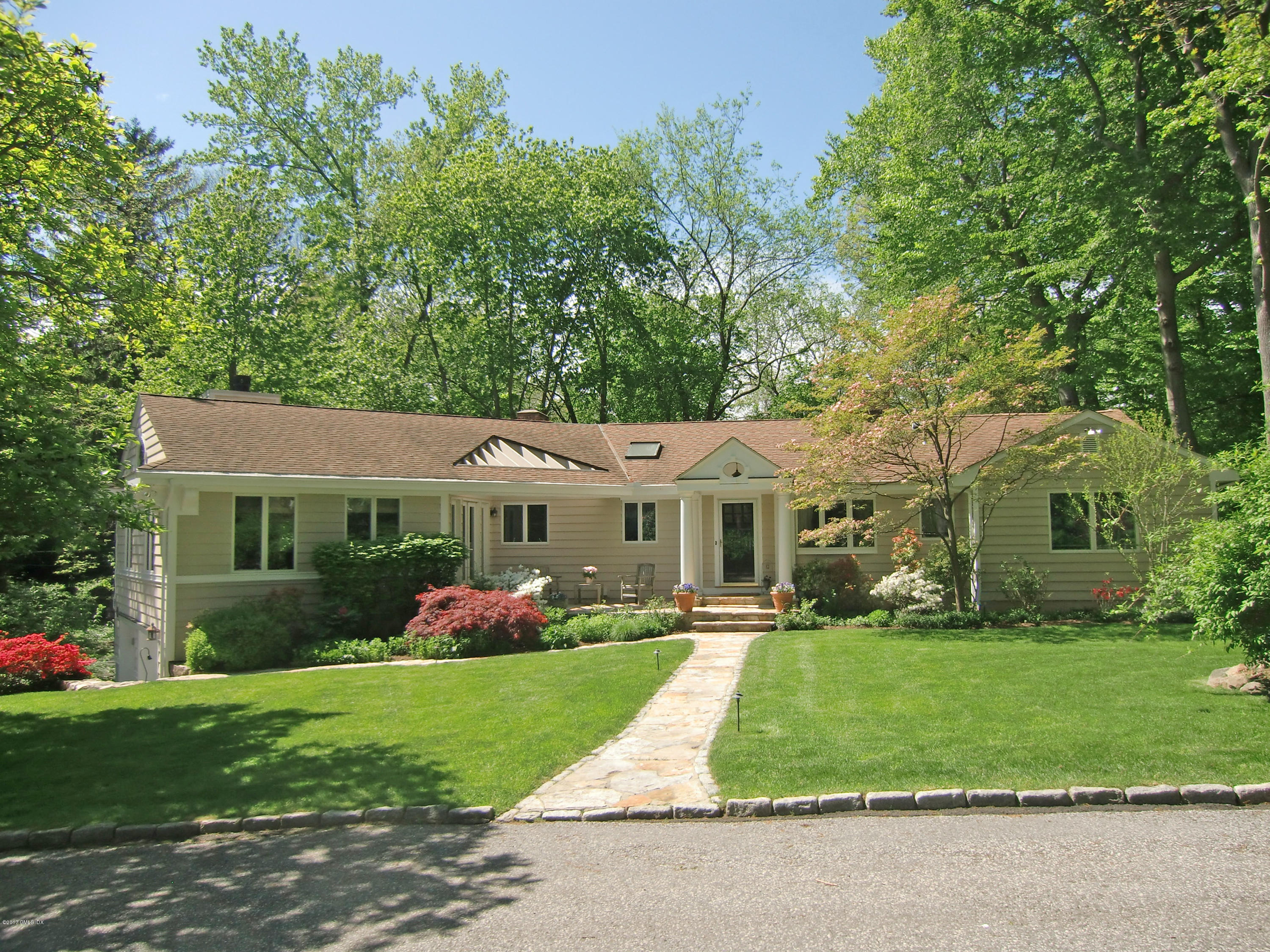 14 Weston Hill Road Riverside, CT 06878 - Photo 1 of 18 front view of house with a yard