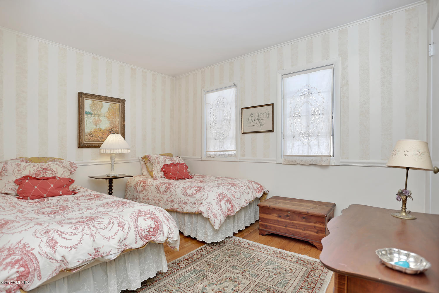 14 Weston Hill Road Riverside, CT 06878 - Photo 11 of 18 a bedroom with two beds and a night stand