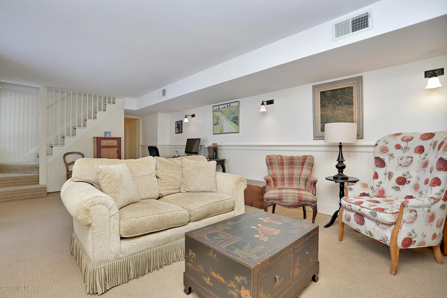 14 Weston Hill Road Riverside, CT 06878 - Photo 13 of 18 a living room with furniture and a fireplace