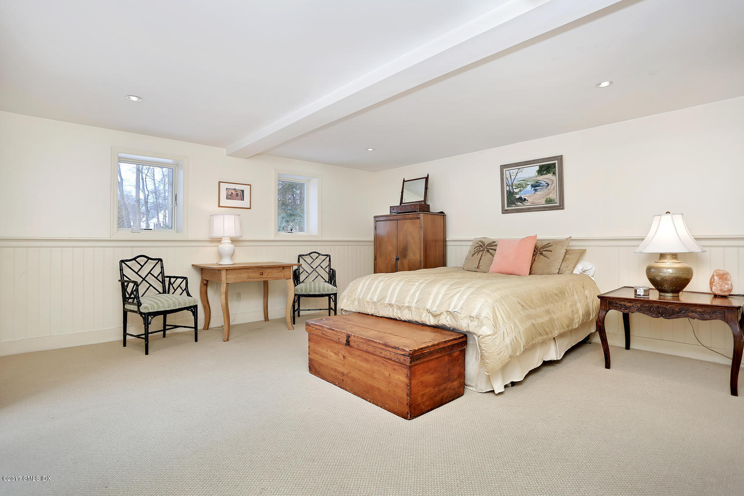 14 Weston Hill Road Riverside, CT 06878 - Photo 14 of 18 a spacious bedroom with a bed and a couch