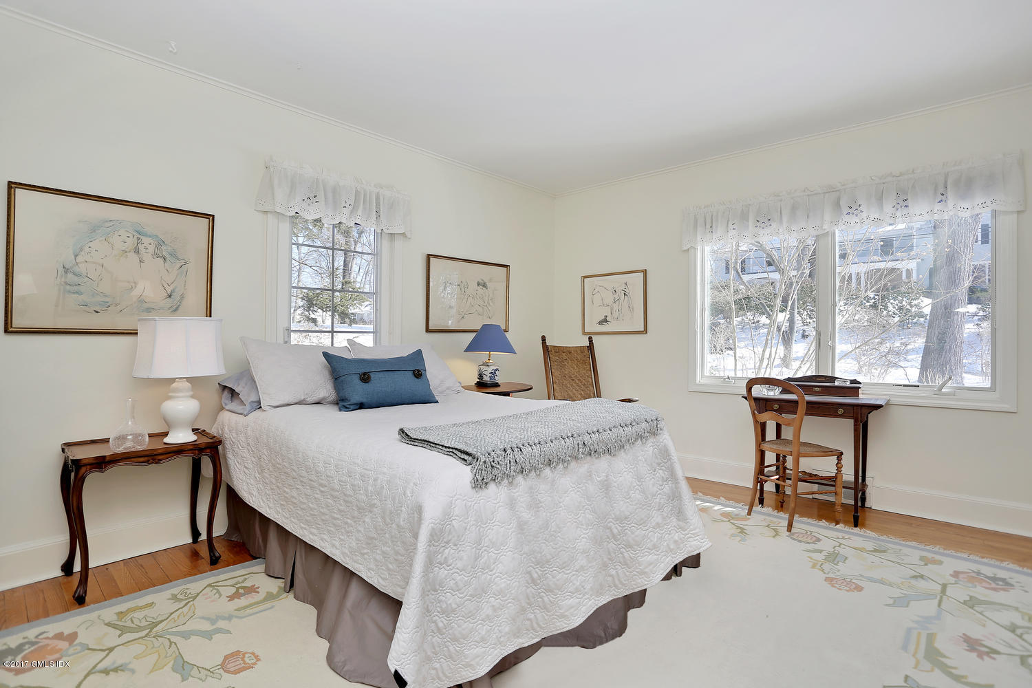 14 Weston Hill Road Riverside, CT 06878 - Photo 9 of 18 a bedroom with a bed and a table in it