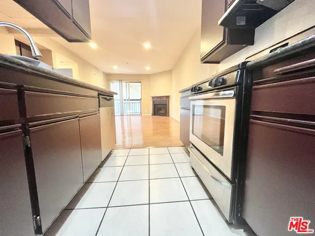 a view of empty room with windows