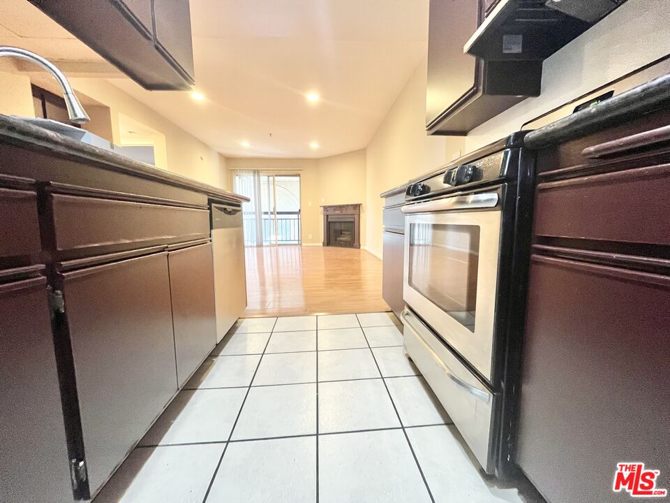 8722 Burton Way, Unit 102 Los Angeles, CA 90048 - Photo 7 of 11 a view of empty room with windows