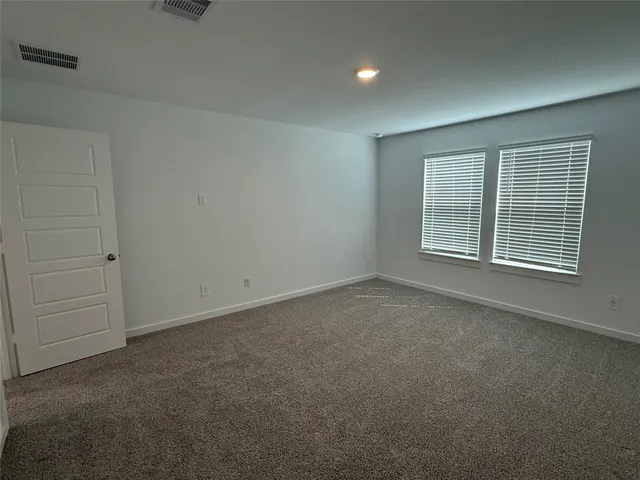 an empty room with an entryway