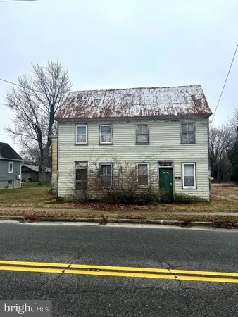 a view of a house with a swimming pool