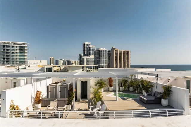 a view of a living room and kitchen view