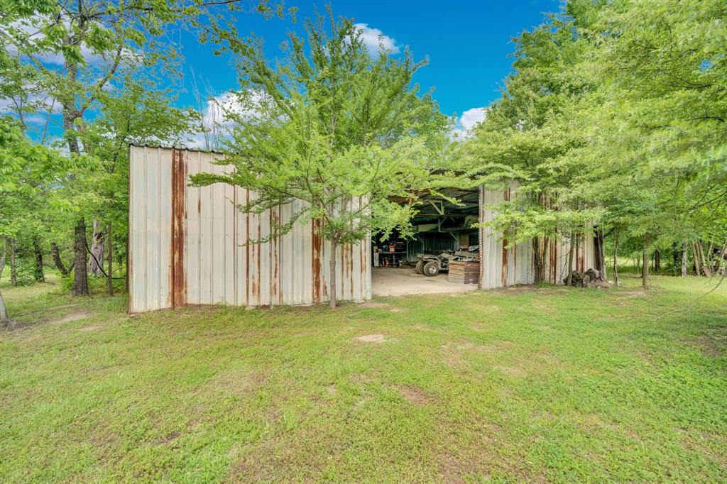 10476 County Road 313 Terrell, TX 75161 - Photo 33 of 40 a view of a yard with a tree