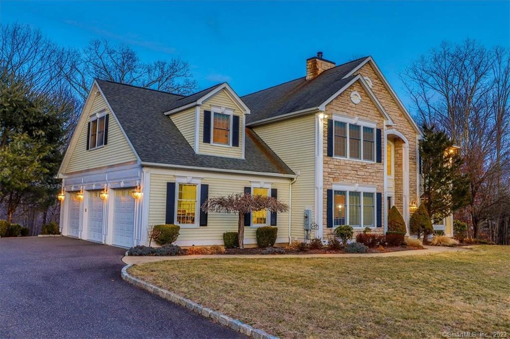 This elegant four to five bedroom colonial sits on a cul-de-sac minutes to I84