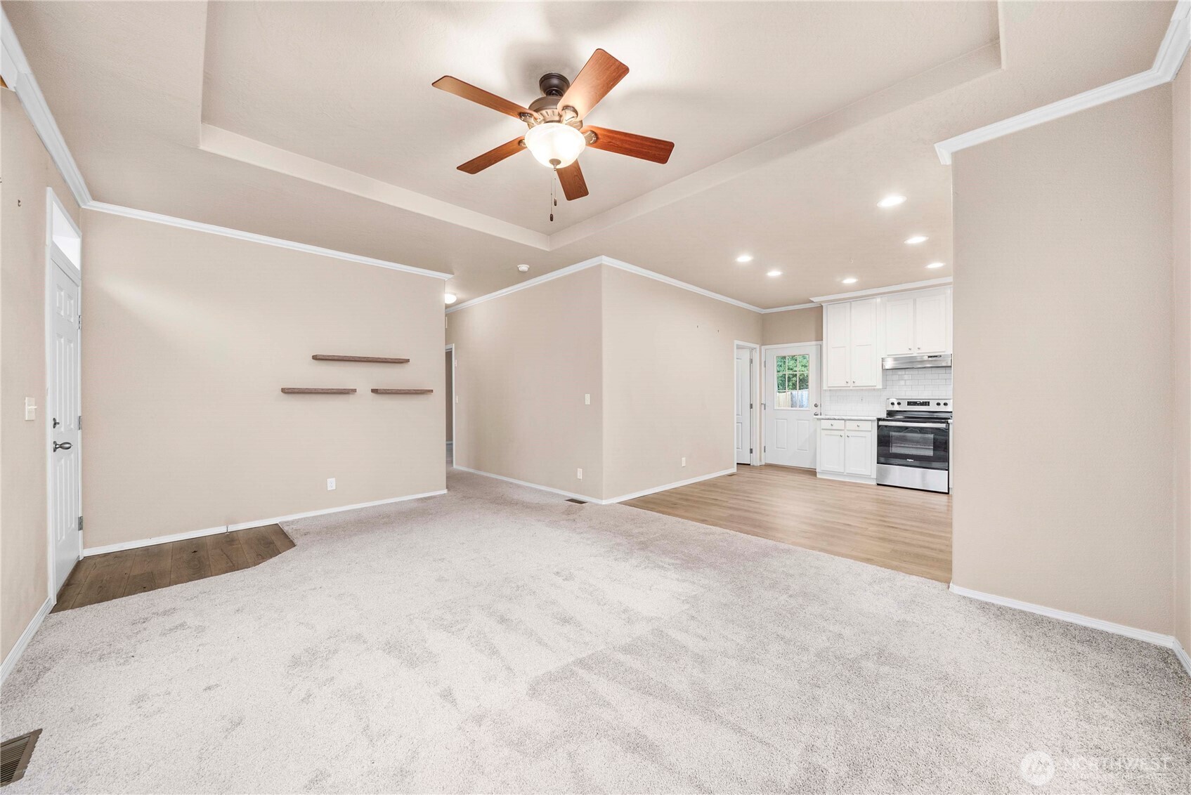 52 Southeast Spring Street Chehalis, WA 98532 - Photo 17 of 40 an empty room with windows and ceiling fan