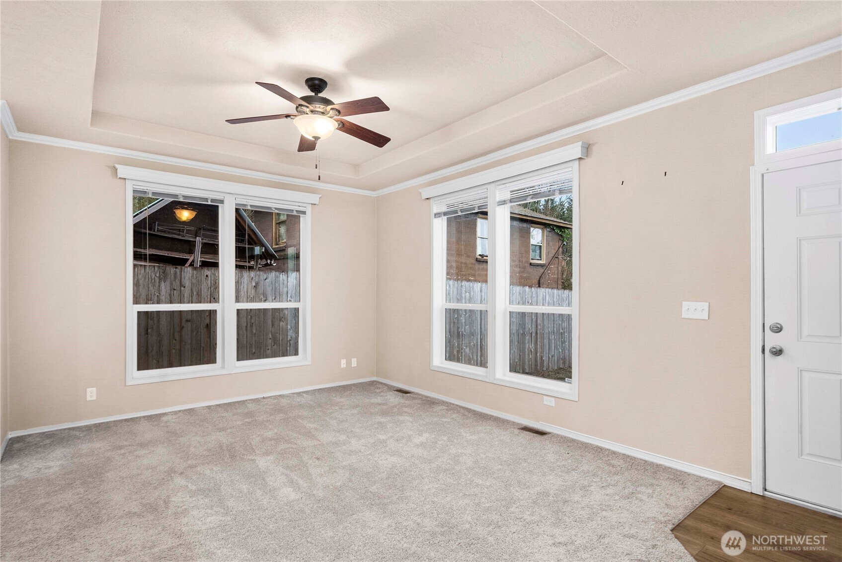 52 Southeast Spring Street Chehalis, WA 98532 - Photo 18 of 40 a view of an empty room with a window and ceiling fan