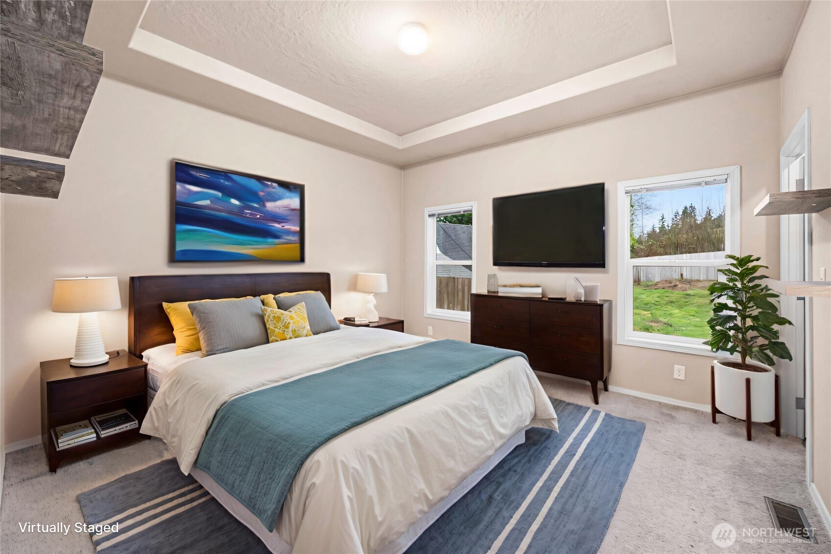 52 Southeast Spring Street Chehalis, WA 98532 - Photo 19 of 40 a bedroom with a bed and a flat screen tv