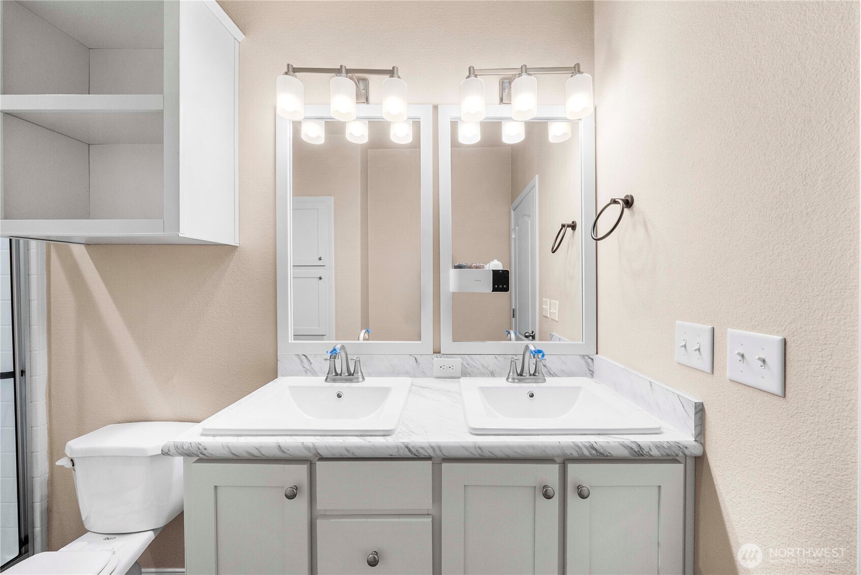 52 Southeast Spring Street Chehalis, WA 98532 - Photo 23 of 40 a bathroom with a granite countertop sink a toilet and a mirror