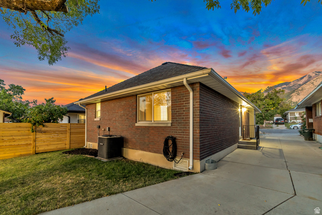 Undisclosed Address Ogden, UT 84403 - Photo 5 of 21 View of property exterior featuring brick siding and a cooling unit