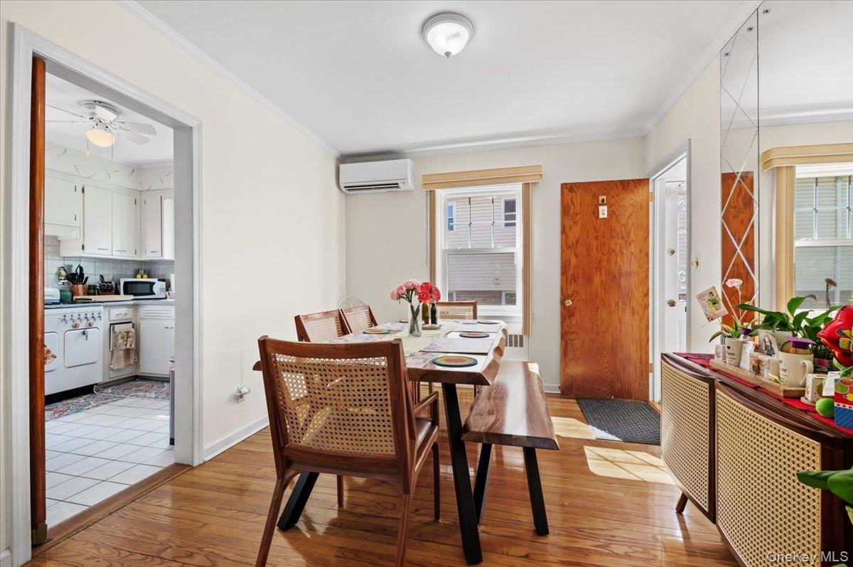 183-41 Dalny Road Queens, NY 11432 - Photo 10 of 31 a view of a dining room with furniture window and wooden floor