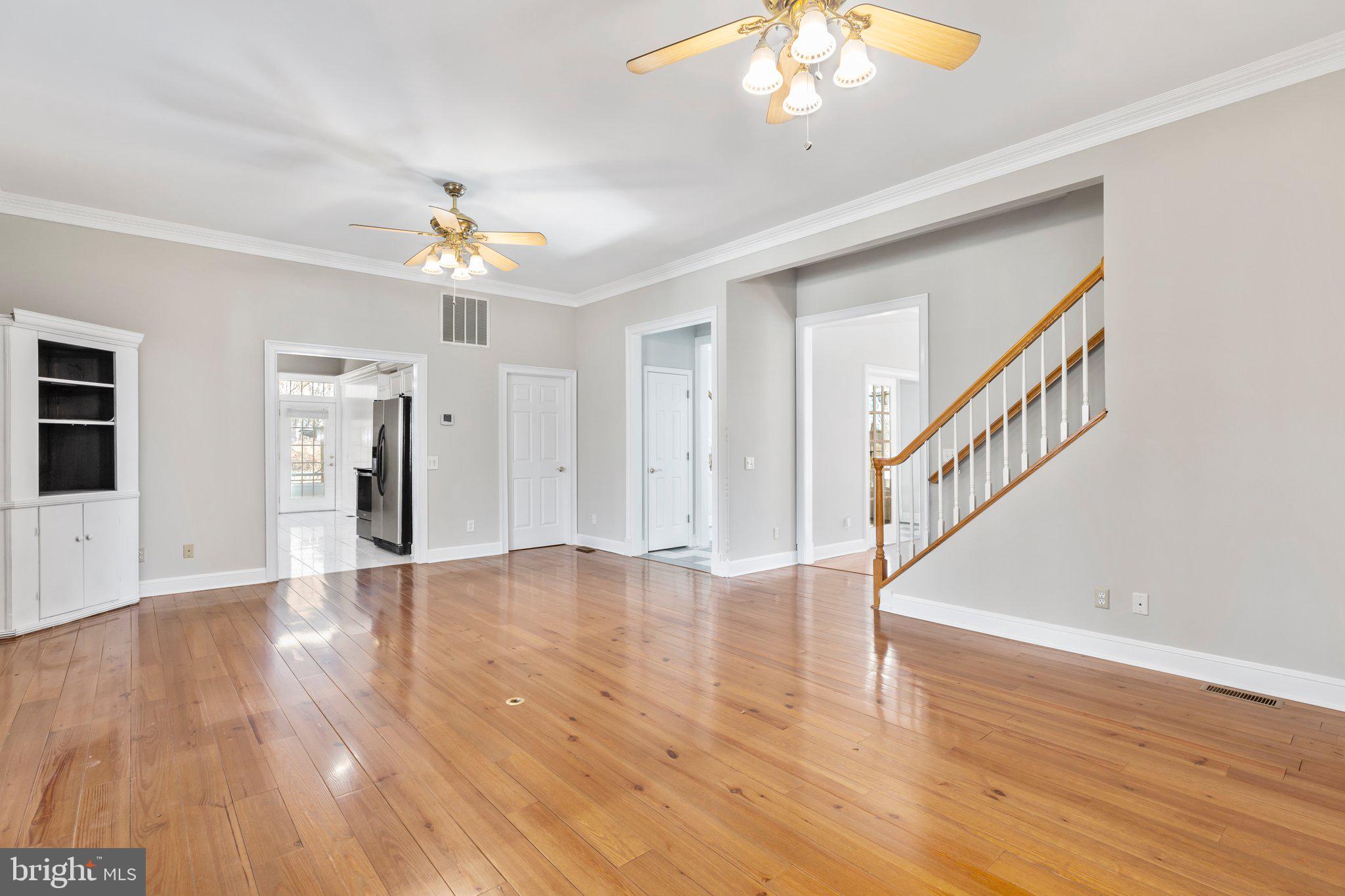 19149 Stoney Point Road King George, VA 22485 - Photo 23 of 81 Living Room/2nd set of stairs to upstairs