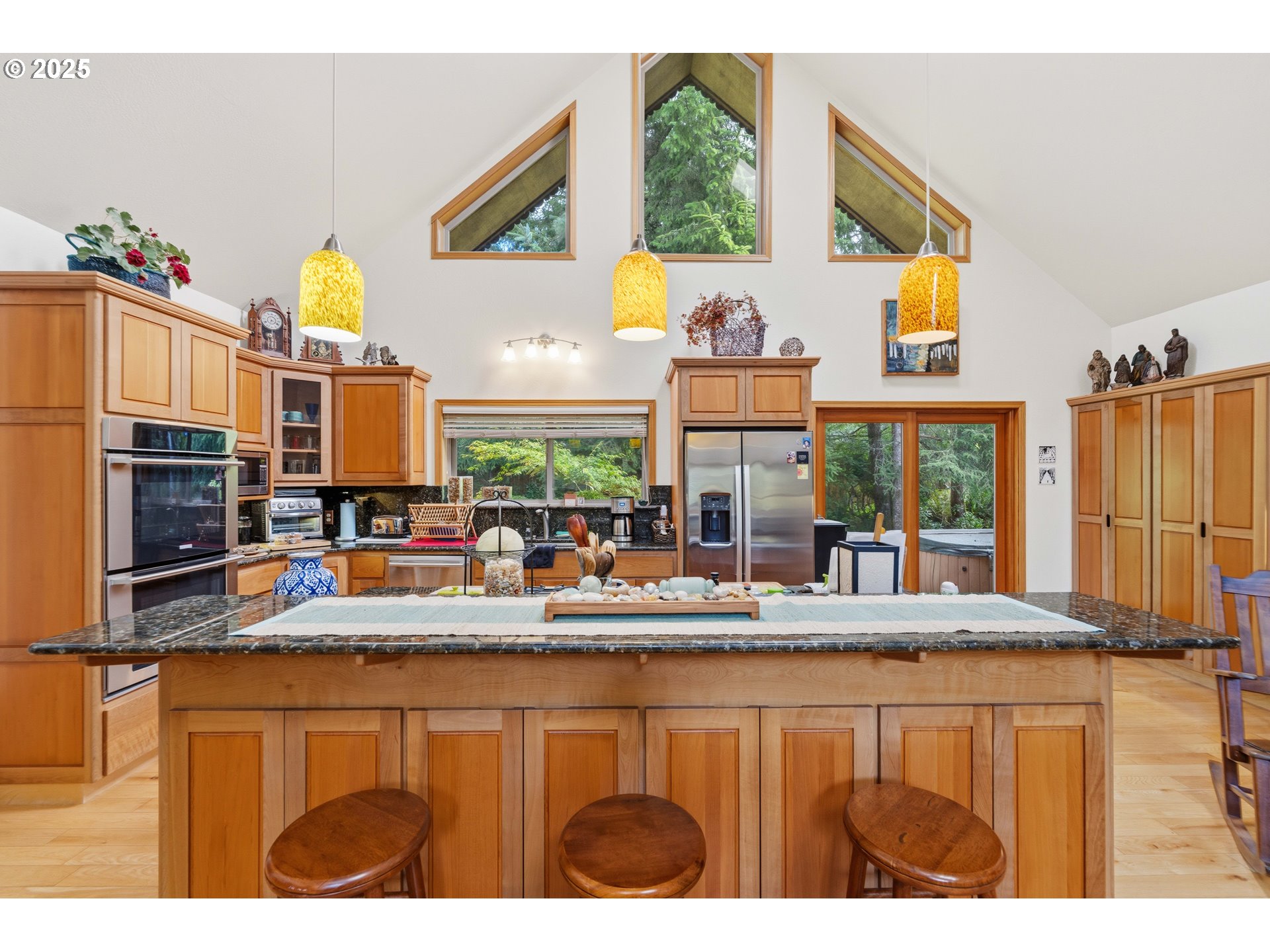 47555 Leeward Street Langlois, OR 97450 - Photo 11 of 45 a kitchen view with granite countertop a sink and a large mirror