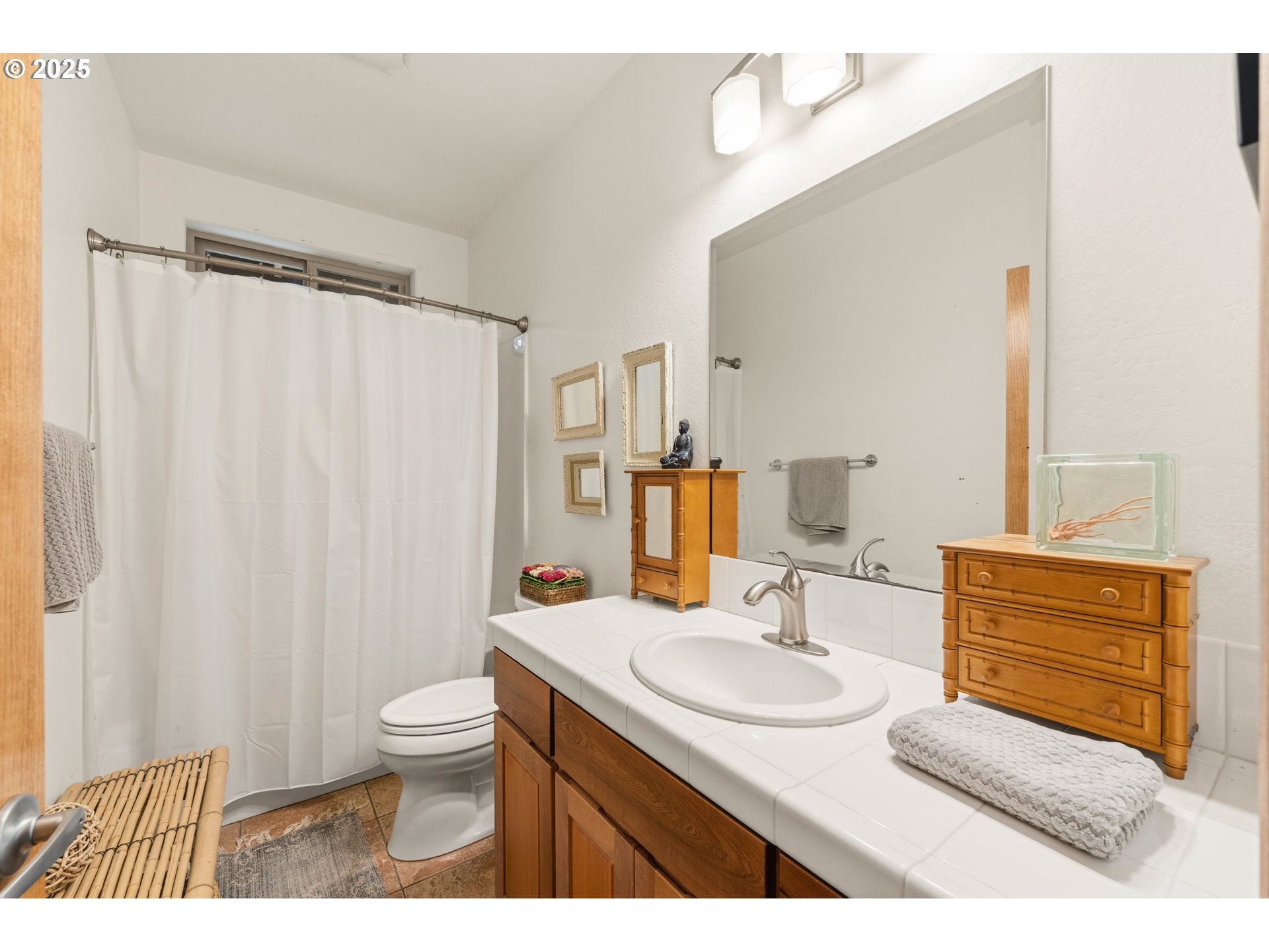 47555 Leeward Street Langlois, OR 97450 - Photo 20 of 45 a bathroom with a sink toilet a mirror and vanity