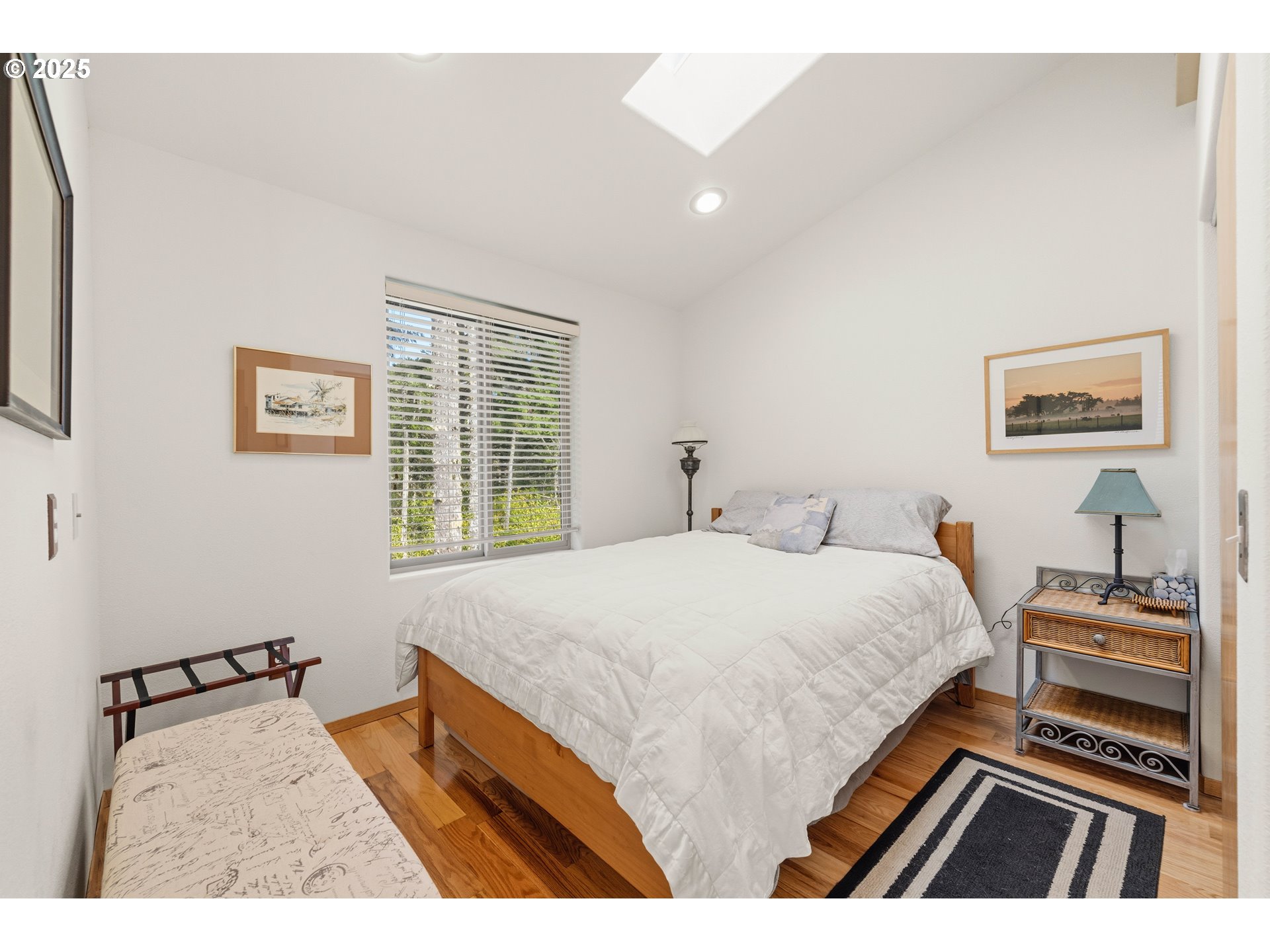 47555 Leeward Street Langlois, OR 97450 - Photo 30 of 45 a bedroom with a bed and a window