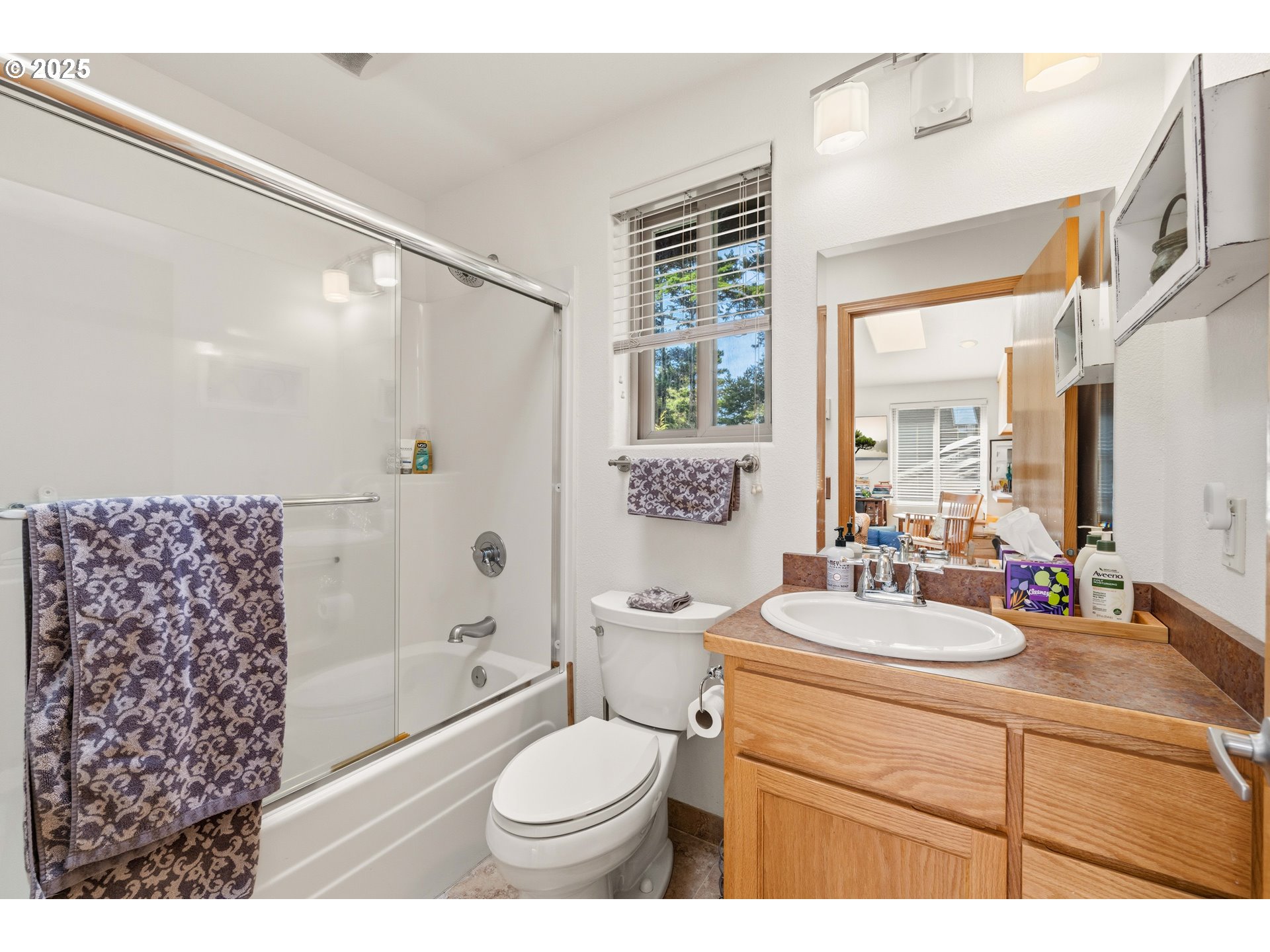 47555 Leeward Street Langlois, OR 97450 - Photo 31 of 45 a bathroom with a sink toilet a shower and a mirror
