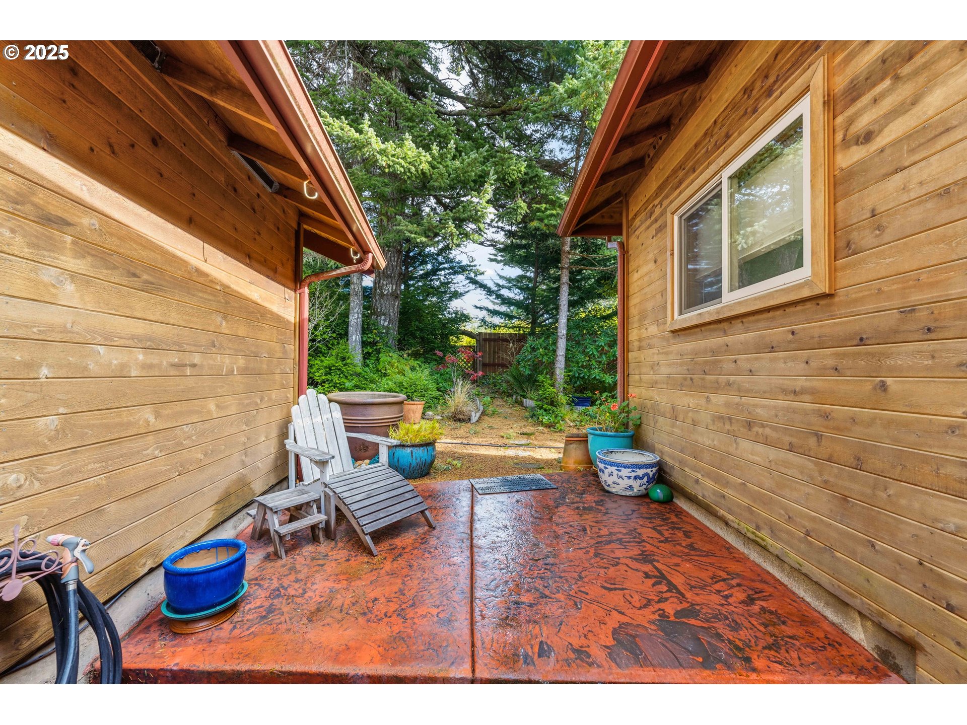47555 Leeward Street Langlois, OR 97450 - Photo 35 of 45 a view of a chairs and table in backyard