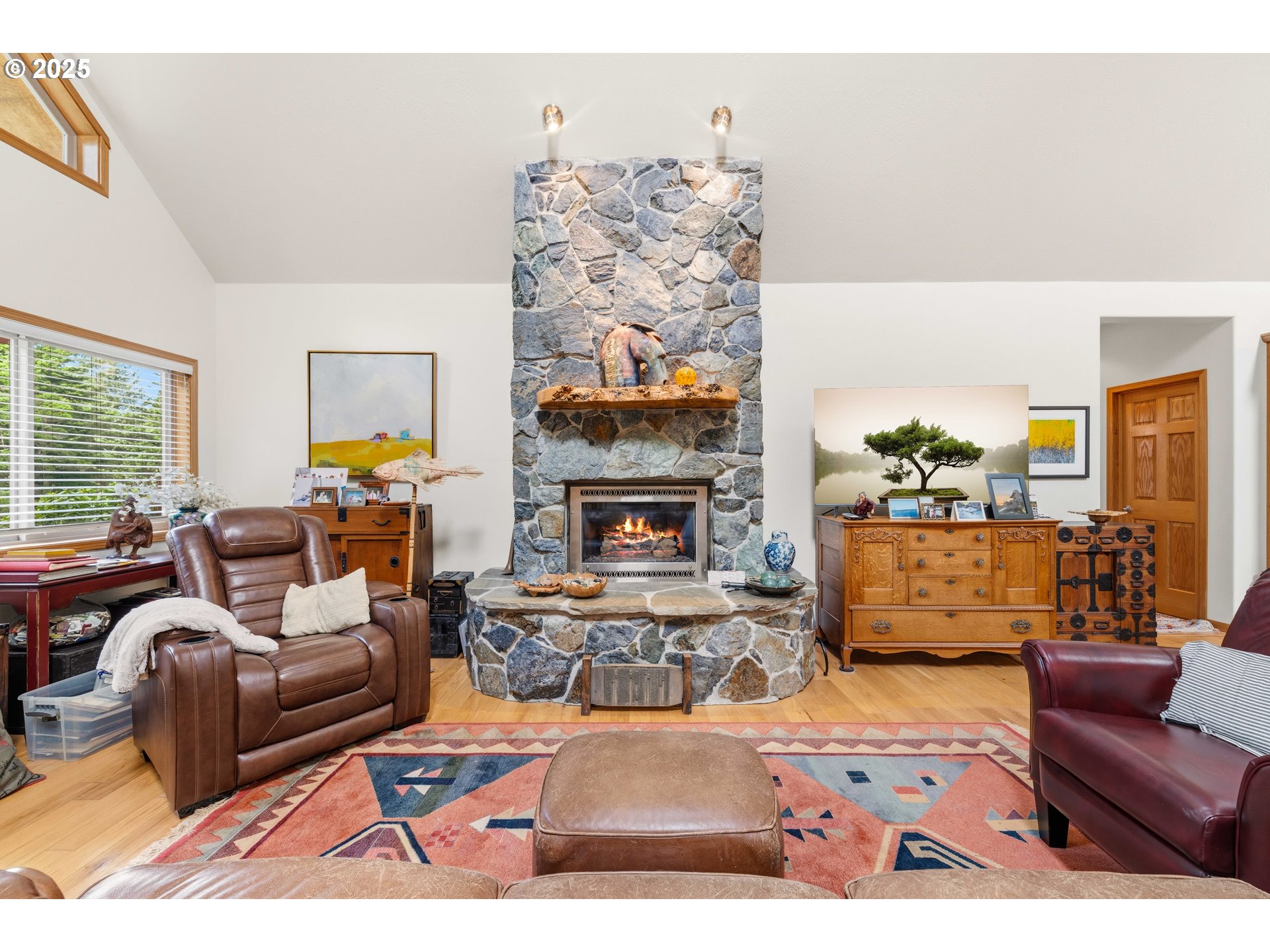 47555 Leeward Street Langlois, OR 97450 - Photo 9 of 45 a living room with furniture and a fireplace