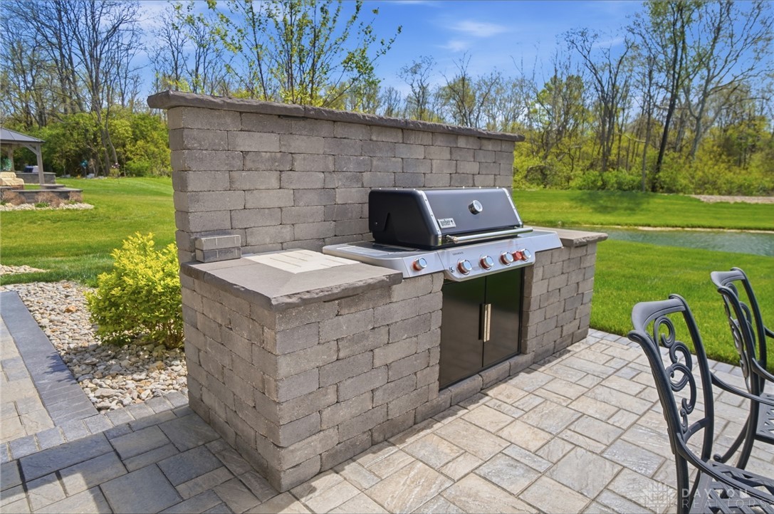 1247 Normandy Rue Dayton, OH 45458 - Photo 62 of 76 This outdoor kitchen and grill area offers a perfect setting for al fresco dining and entertaining.