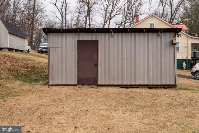 a wooden door in front of a house
