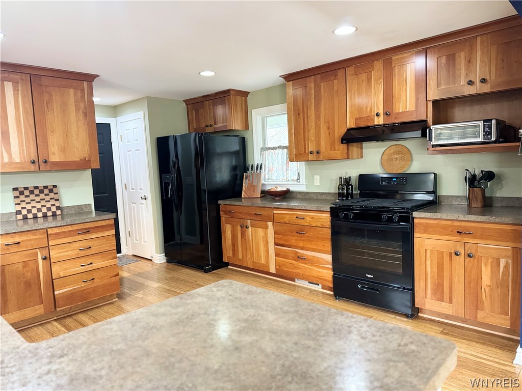 6668 Milestrip Road Orchard Park, NY 14127 - Photo 5 of 30 Brand new stove and refrigerator are included.