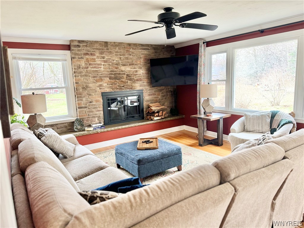 6668 Milestrip Road Orchard Park, NY 14127 - Photo 10 of 30 Enjoy the real wood fireplace! TV is included.