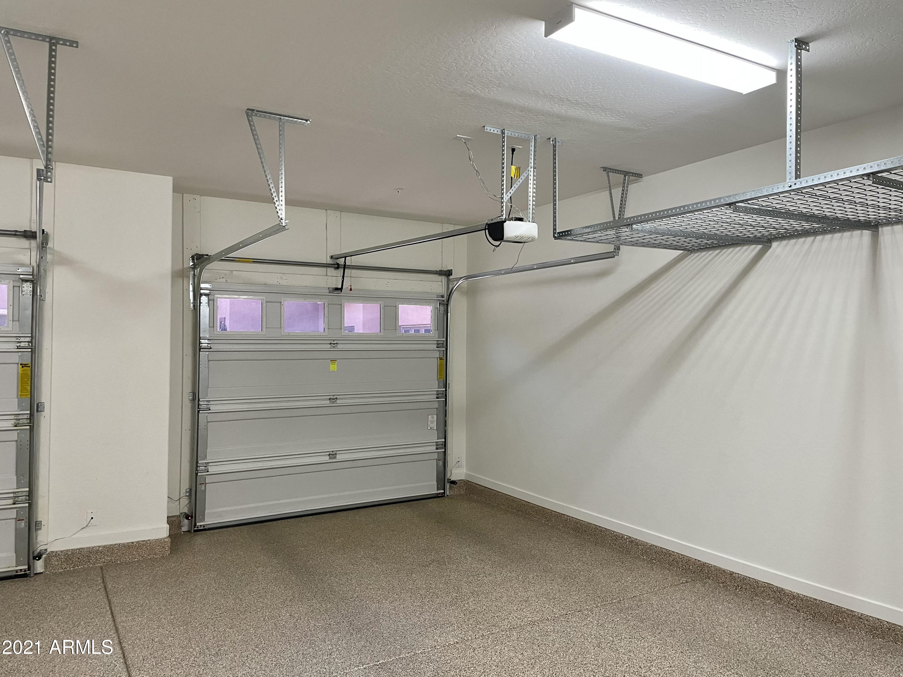 3935 East Rough Rider Road, Unit 1345 Phoenix, AZ 85050 - Photo 18 of 35 3935 garage