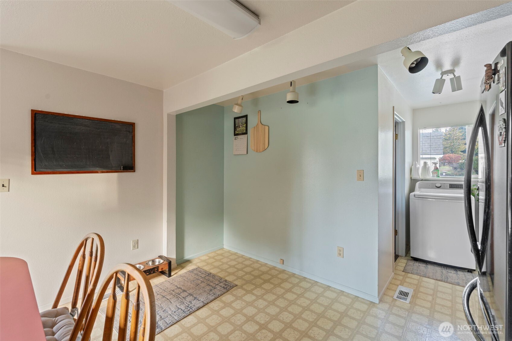 450 Hawkins Road Winlock, WA 98596 - Photo 11 of 40 a bedroom with a bed and a flat screen tv