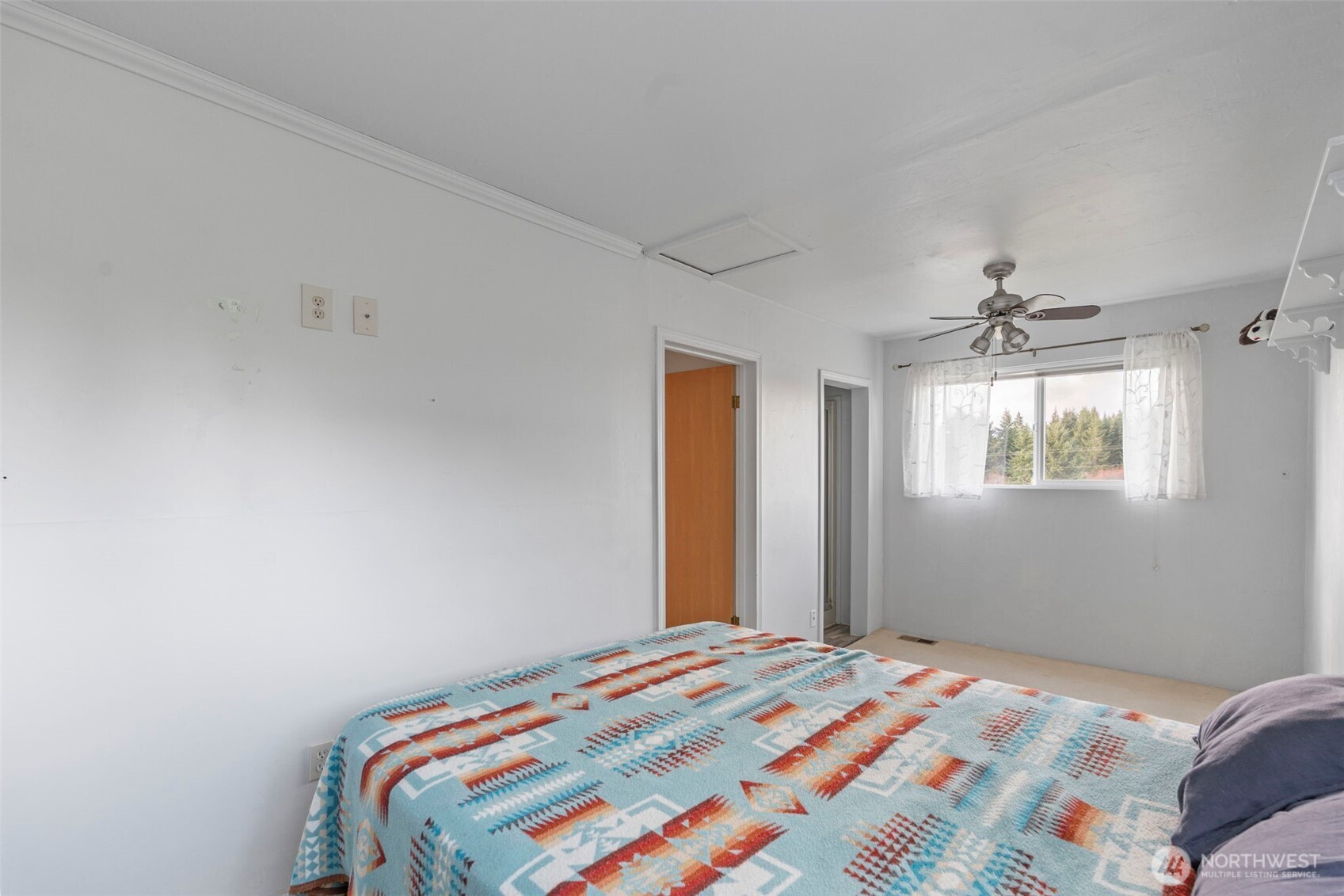 450 Hawkins Road Winlock, WA 98596 - Photo 15 of 40 a bedroom with a bed and a window