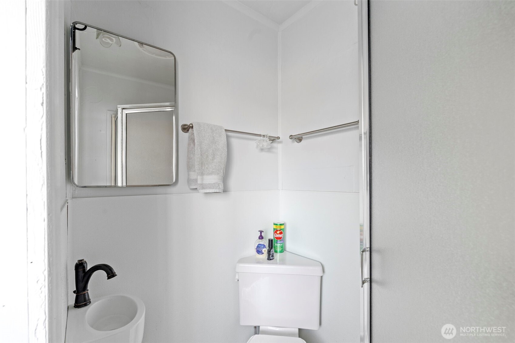 450 Hawkins Road Winlock, WA 98596 - Photo 17 of 40 a bathroom with a toilet sink vanity and mirror