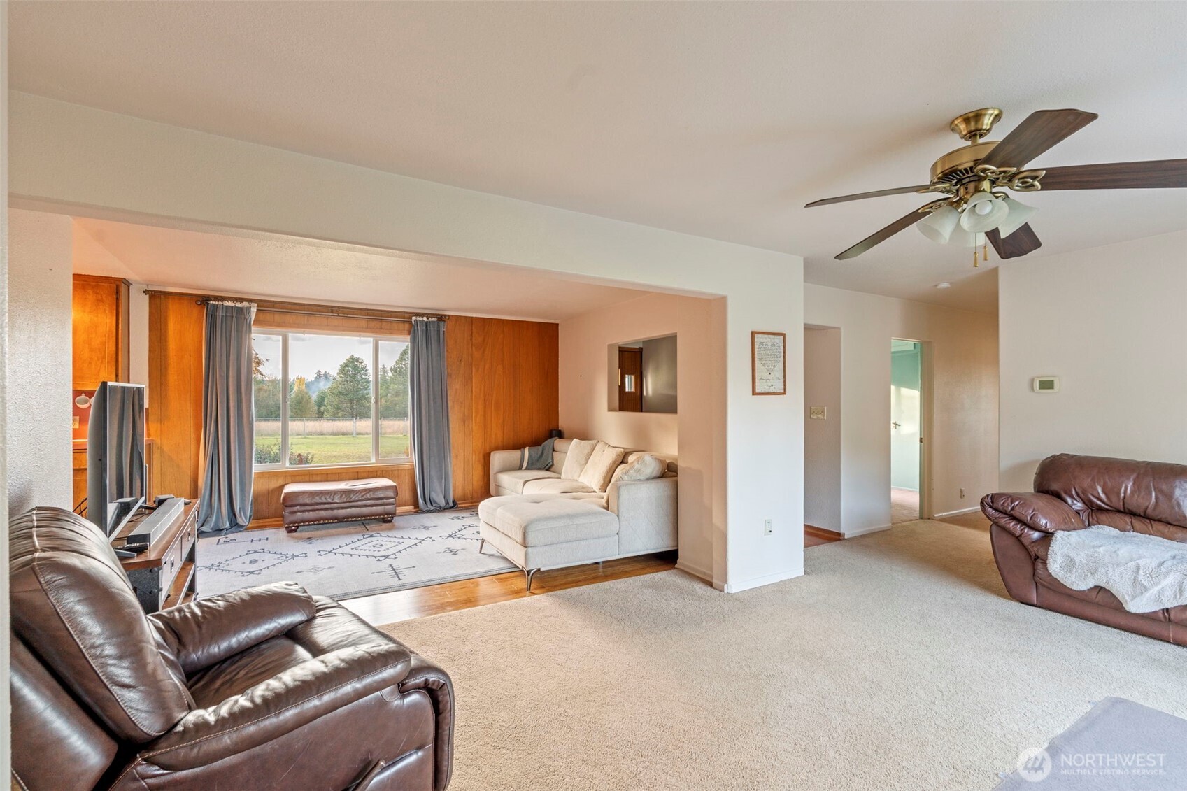 450 Hawkins Road Winlock, WA 98596 - Photo 2 of 40 a living room with furniture ceiling fan