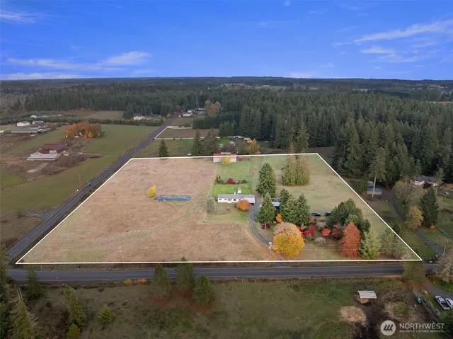 a view of a garden with an outdoor space