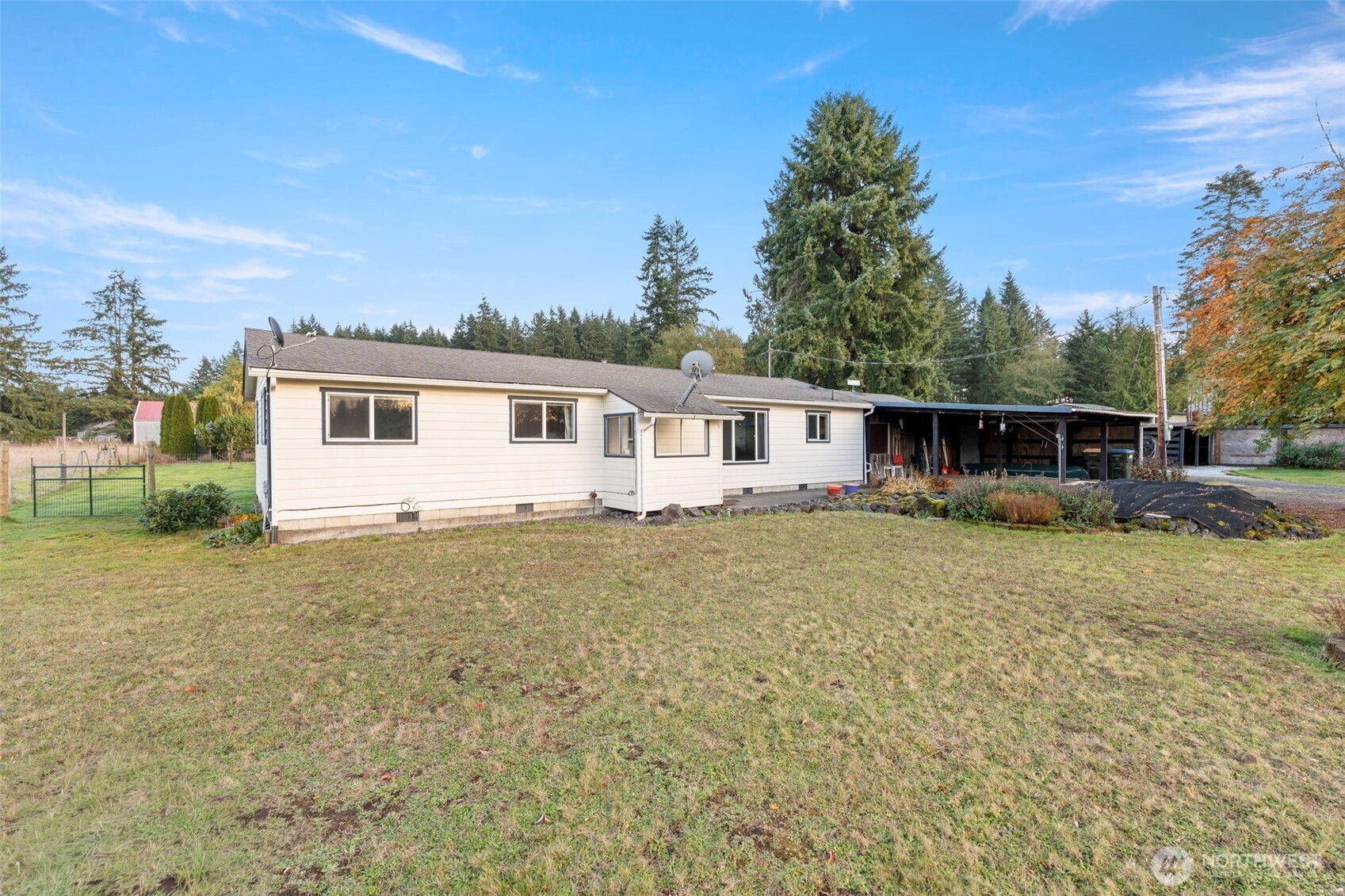 450 Hawkins Road Winlock, WA 98596 - Photo 36 of 40 a view of a house with a backyard