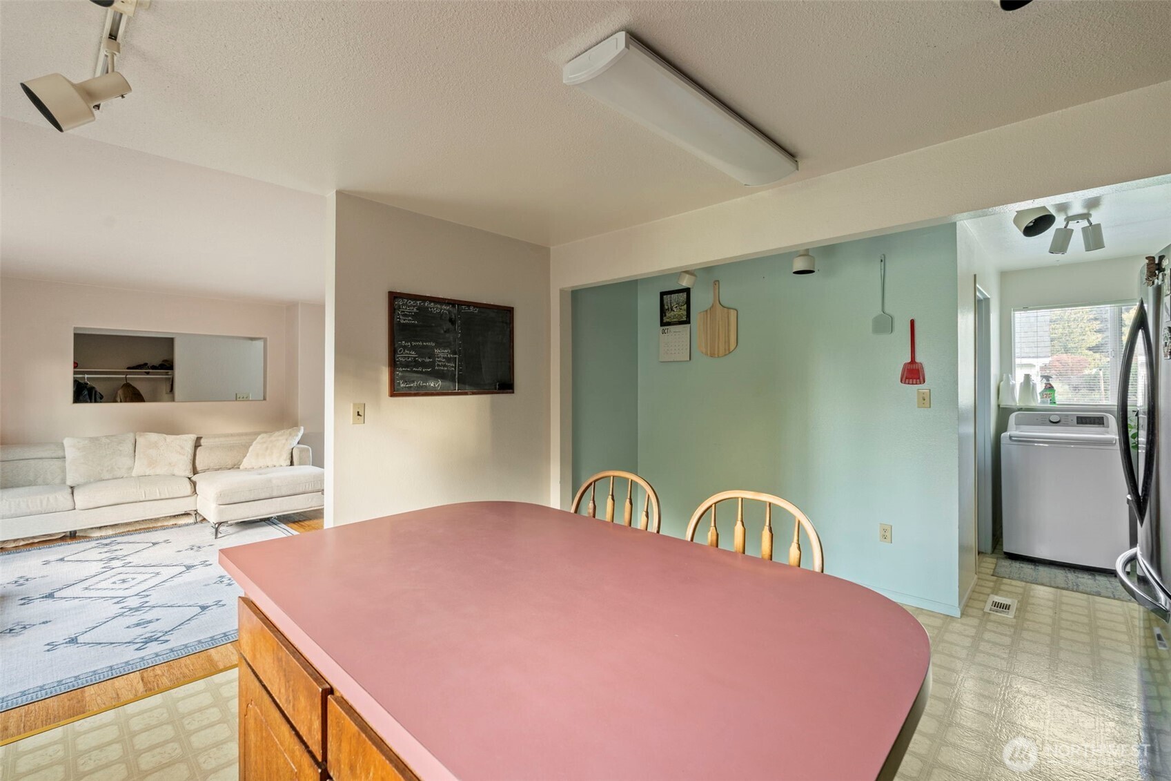 450 Hawkins Road Winlock, WA 98596 - Photo 10 of 40 a bedroom with a bed and a flat screen tv